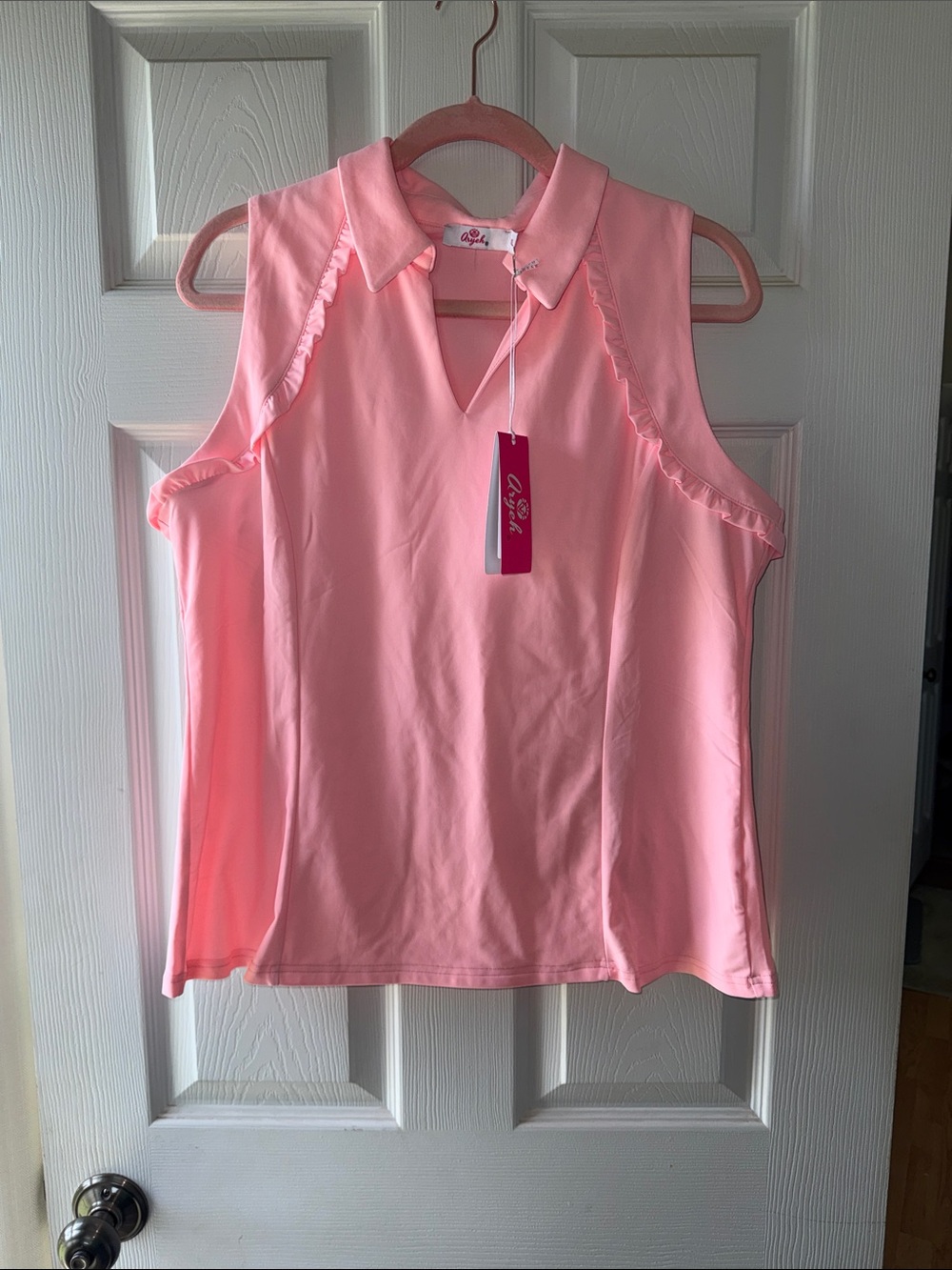 NWT women’s Aryeh athletic/golf shirt. XL,